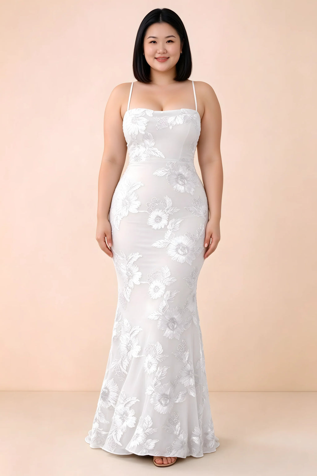 Front studio view of Belinda white floral maxi dress showing the close-fitting bodice and long skirt
