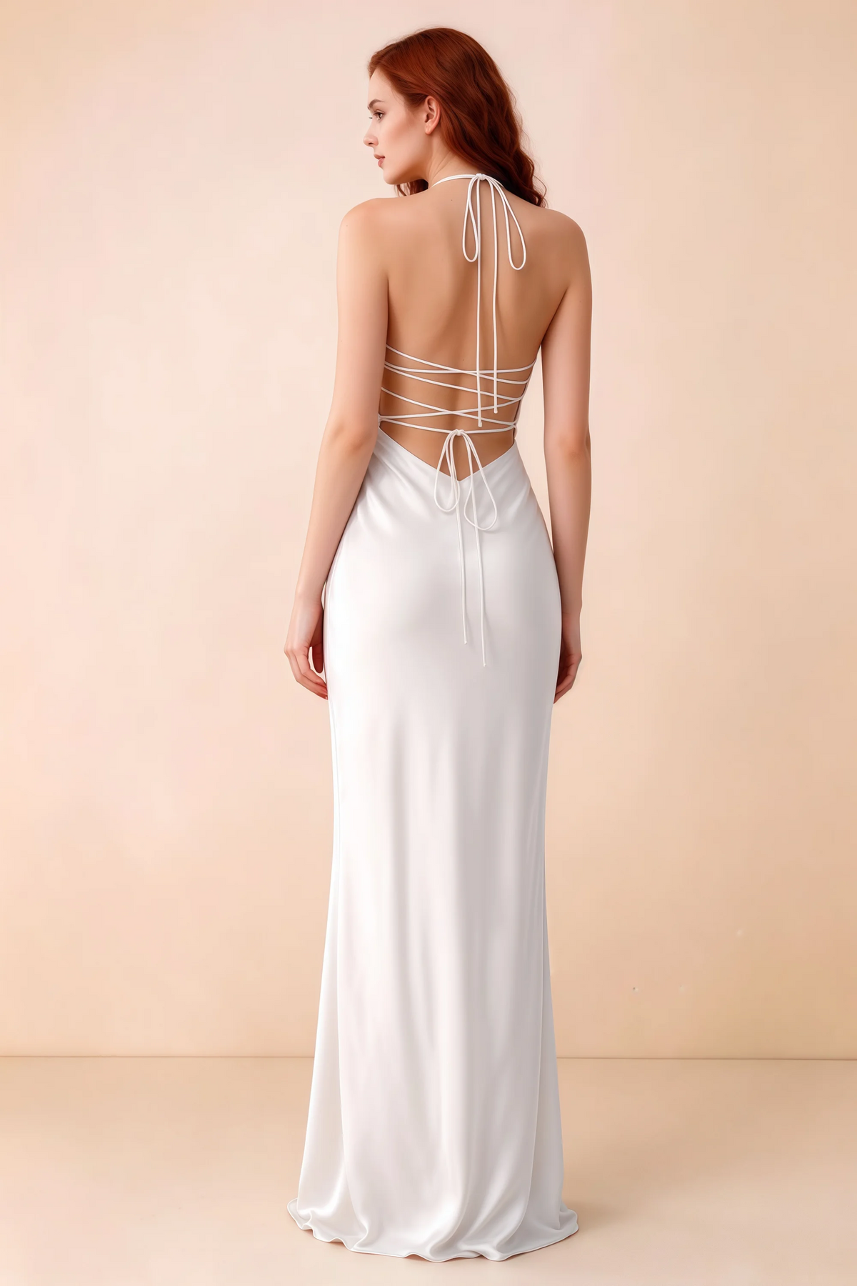 Back studio view of Blanche white dress showing halter neck ties and crossed open-back lacing