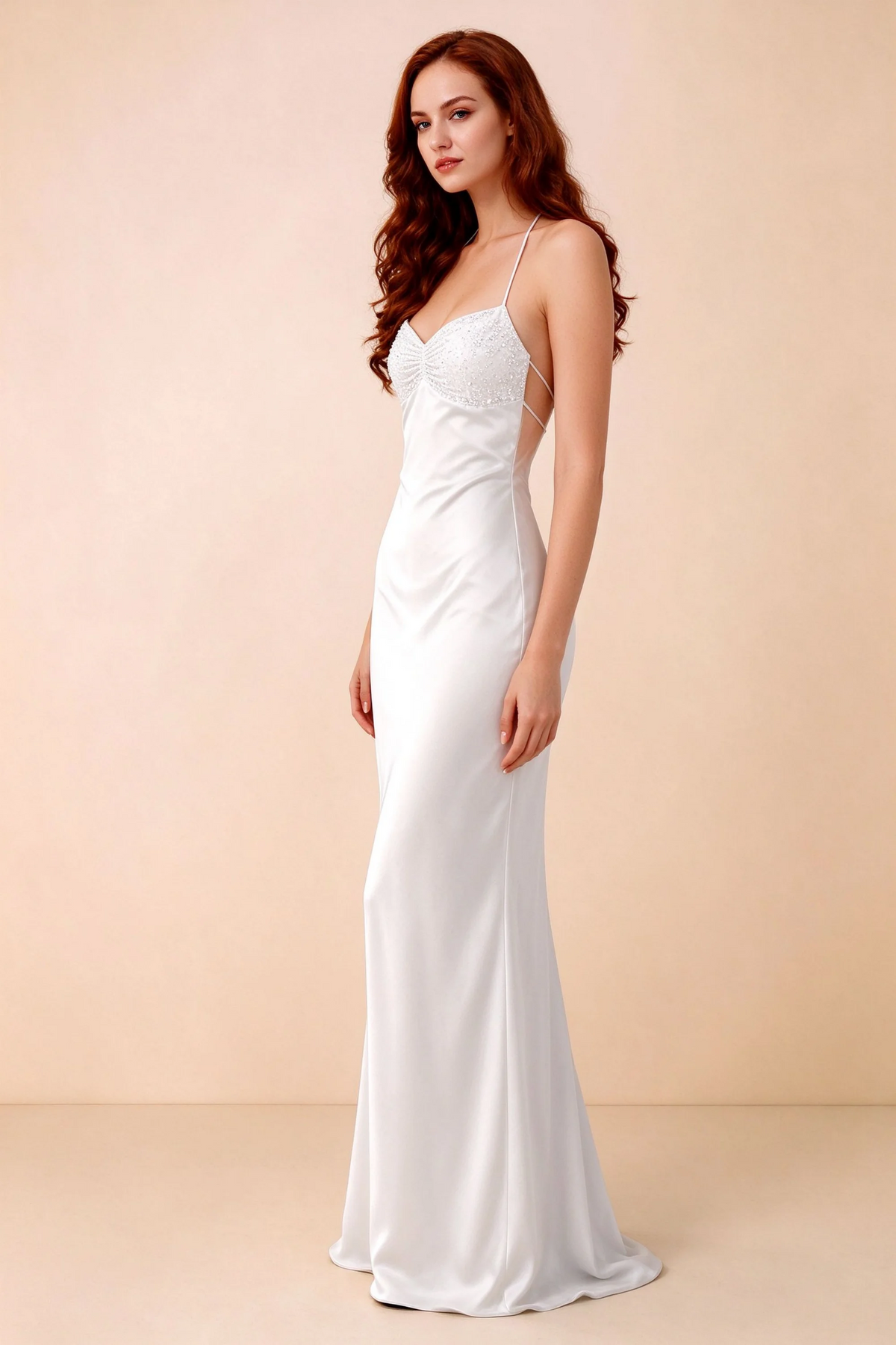 Three-quarter studio view of Blanche white dress showing the fitted hips and flared long hem