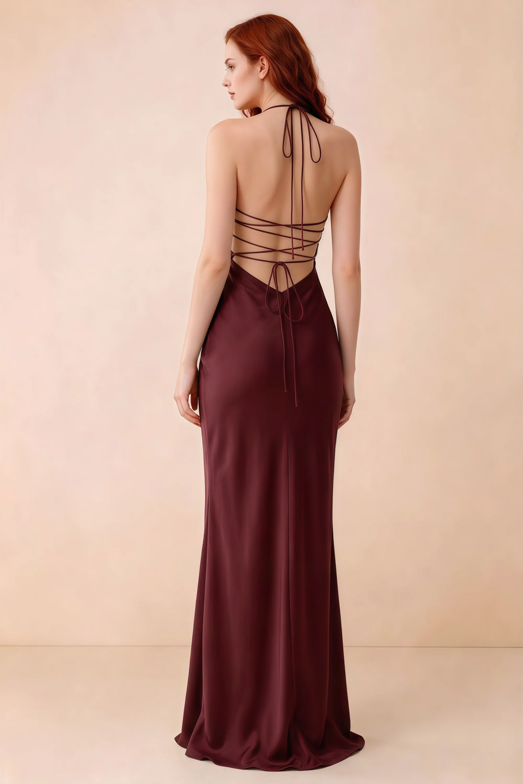 Back studio view of Blanche wine dress showing halter neck ties and crossed open-back lacing