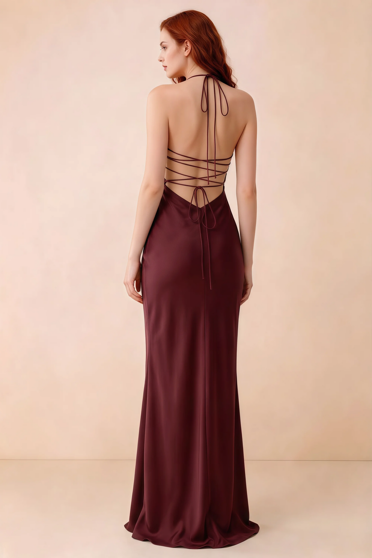 Back studio view of Blanche wine dress showing halter neck ties and crossed open-back lacing