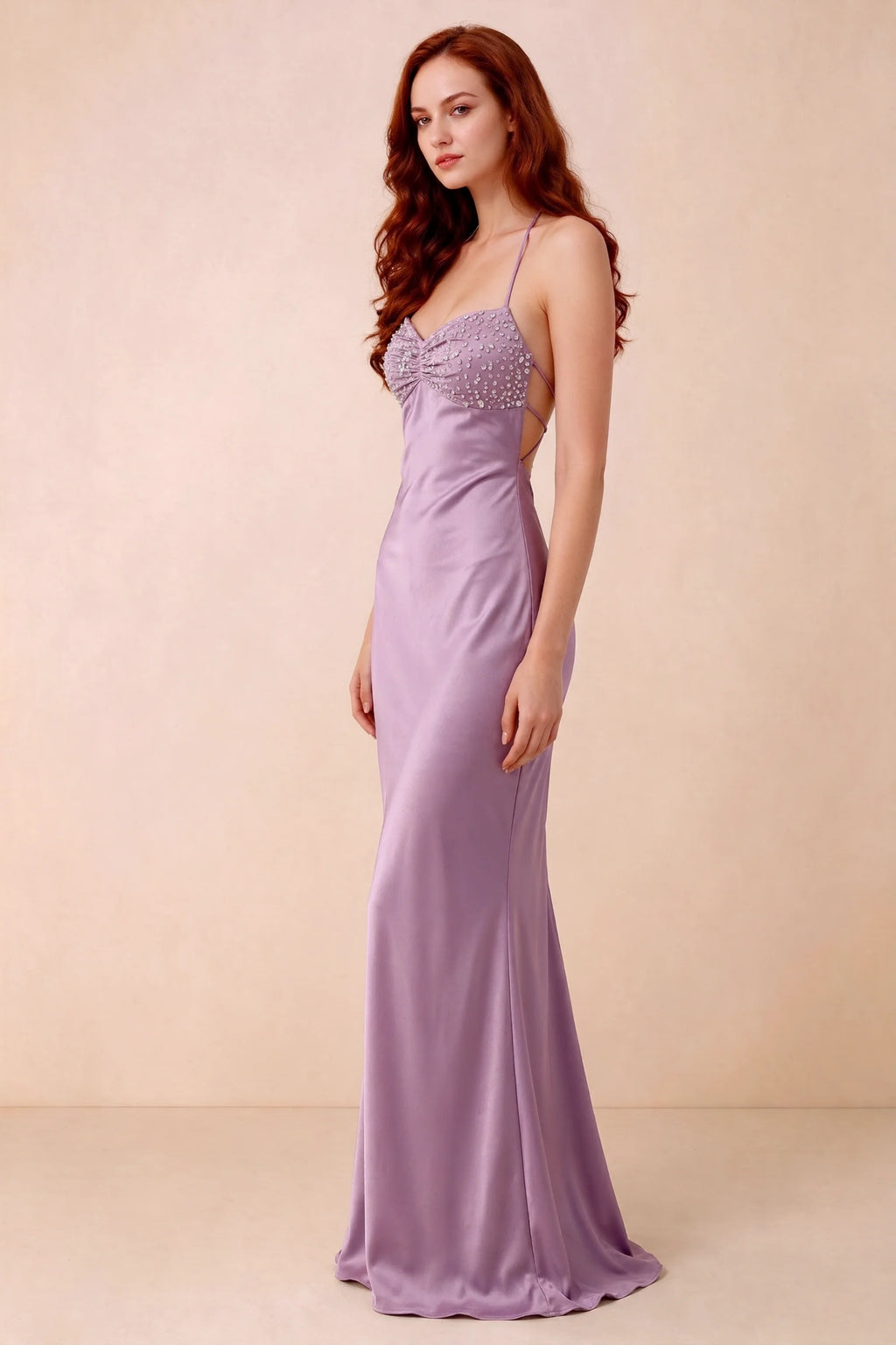 Three-quarter studio view of Blanche wisteria dress showing the fitted hips and flared long hem