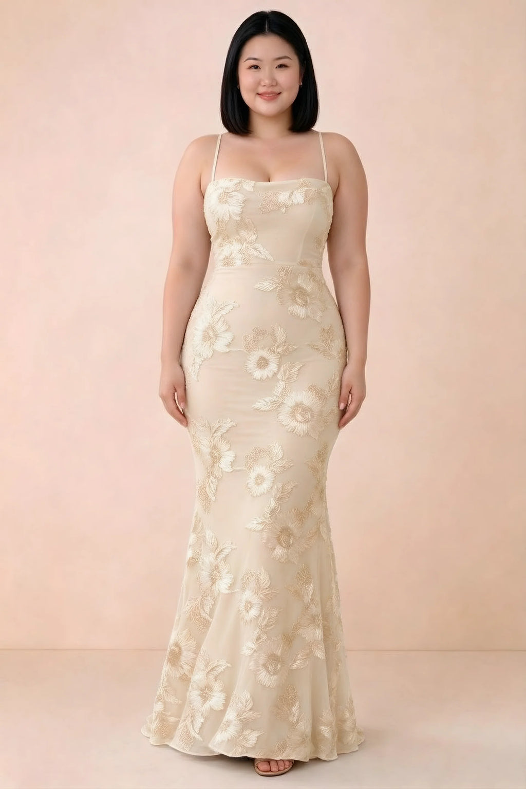 Front studio view of Belinda yellow floral maxi dress showing the close-fitting bodice and long skirt