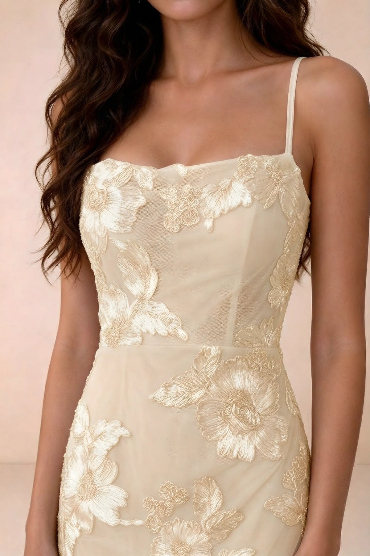 Close-up of Belinda yellow straight neckline, spaghetti straps and raised floral details