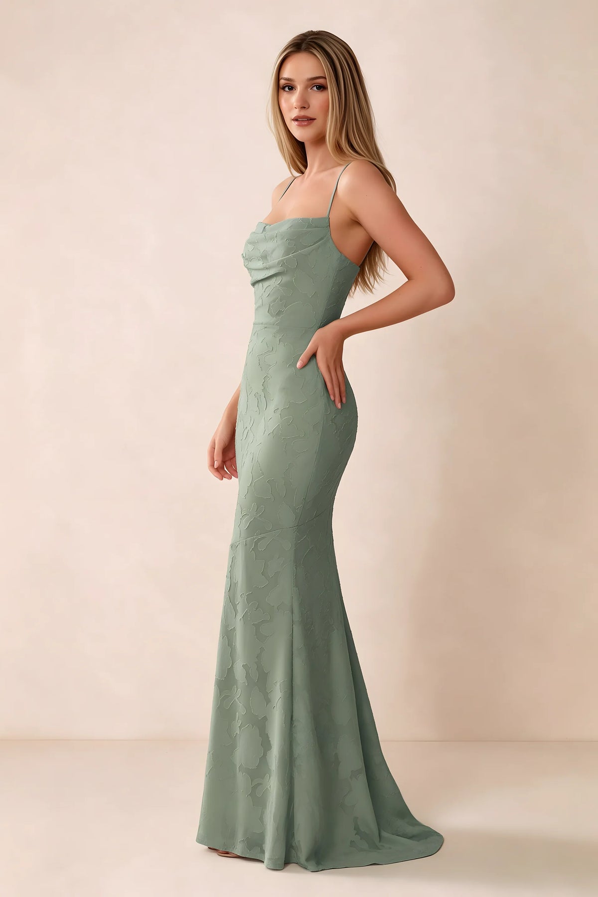 Three-quarter studio view of Bess agave dress showing the close-fitting waist and gently flared hem