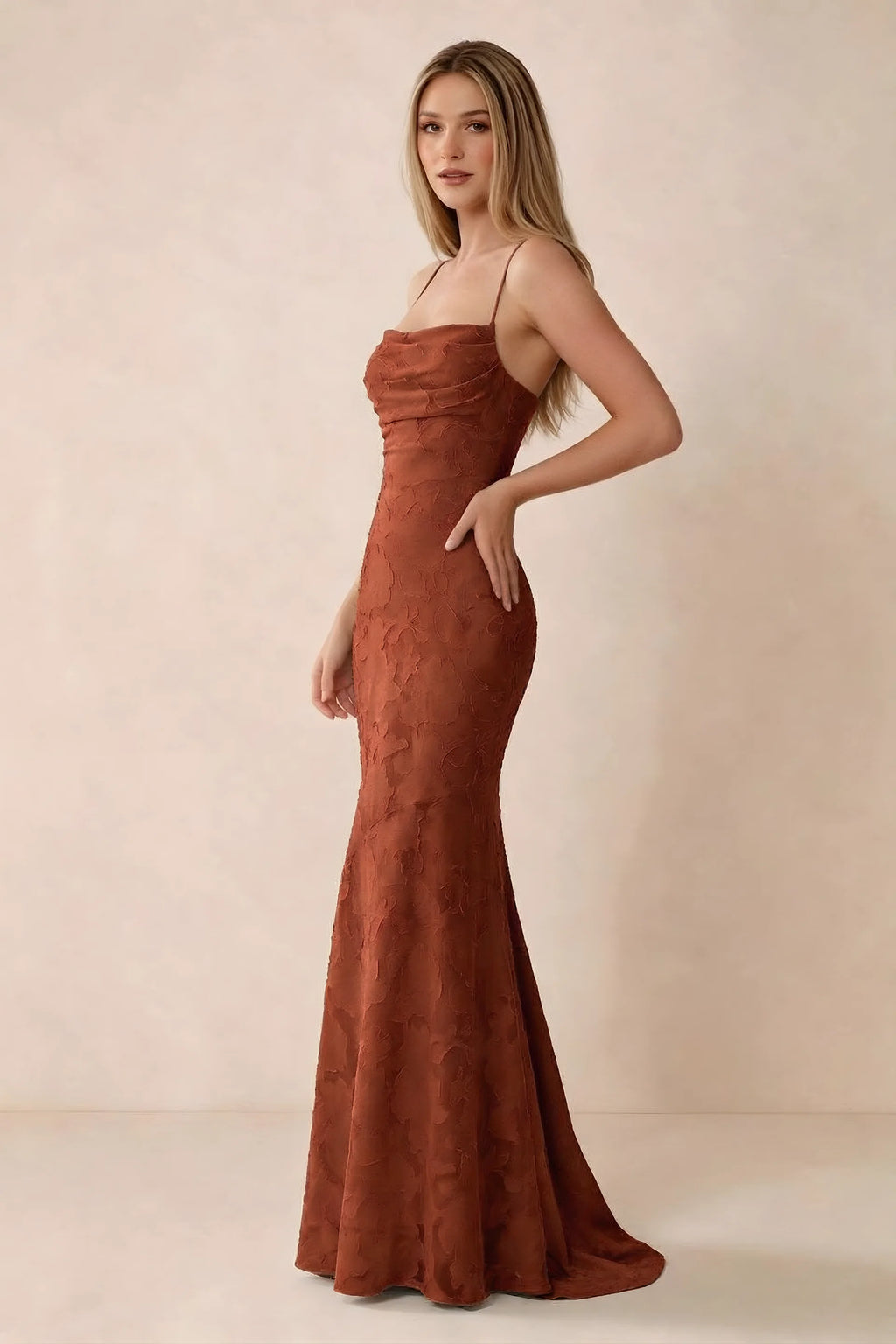 Three-quarter studio view of Bess auburn dress showing the close-fitting waist and gently flared hem