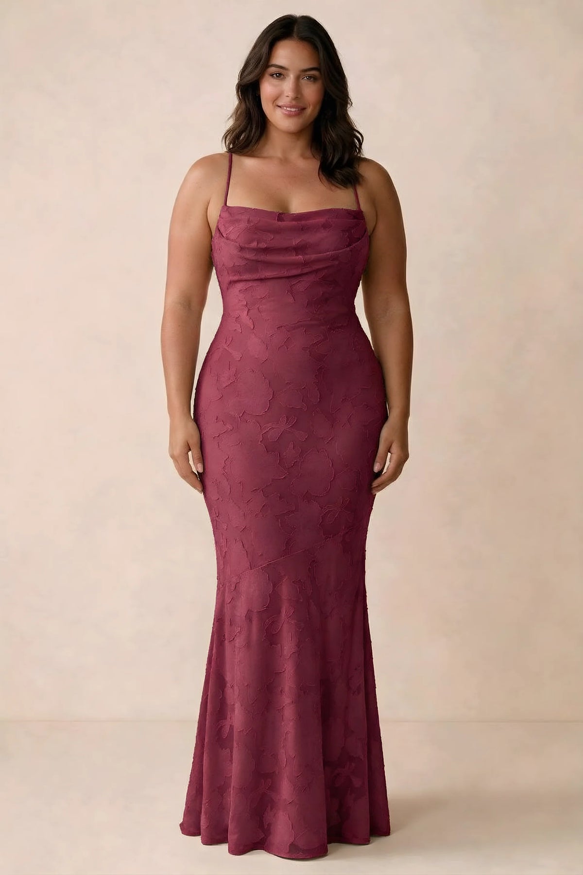 Front studio view of Bess burgundy maxi dress showing tonal floral texture and a long skirt