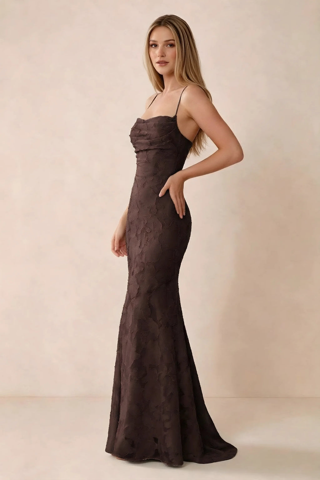 Three-quarter studio view of Bess chocolate dress showing the close-fitting waist and gently flared hem