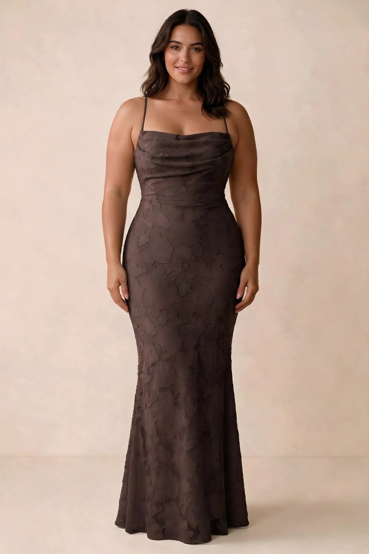 Front studio view of Bess chocolate maxi dress showing tonal floral texture and a long skirt