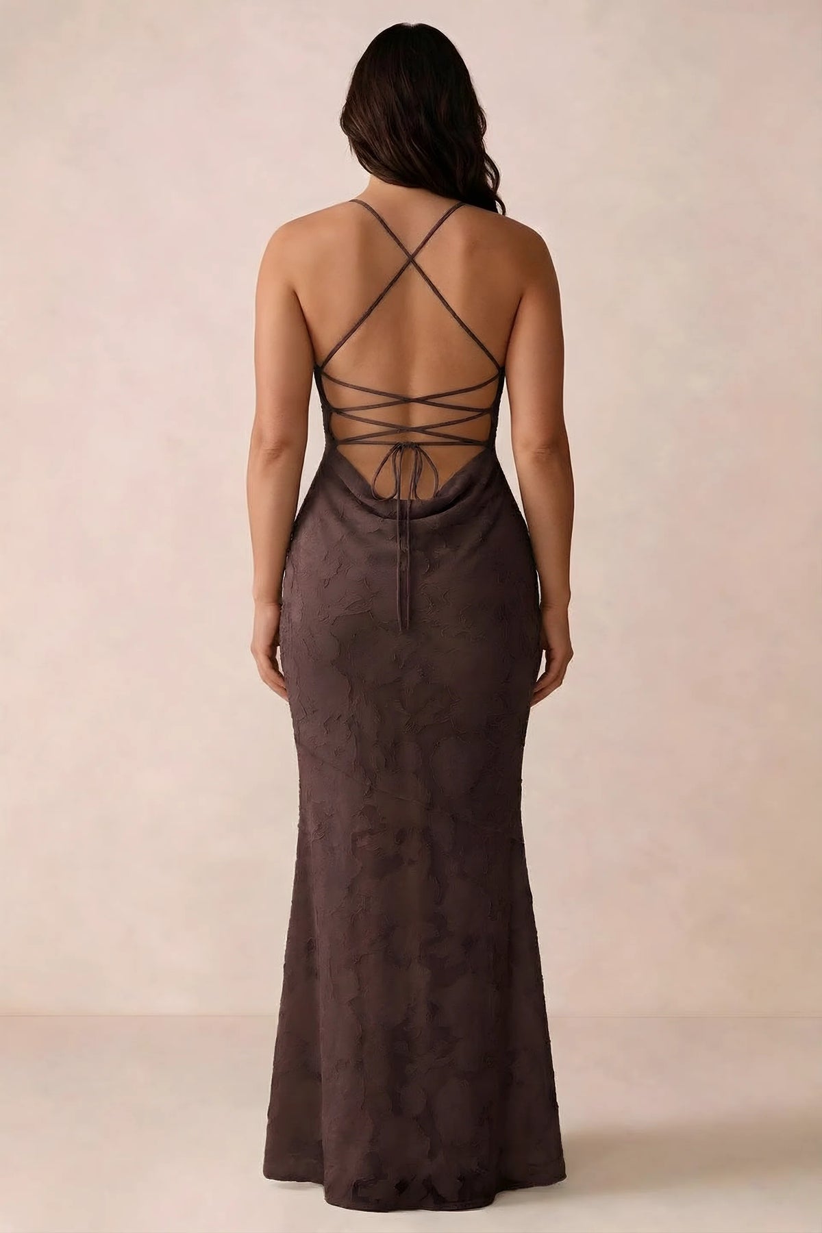 Back studio view of Bess chocolate dress showing the crossed straps and full-length silhouette