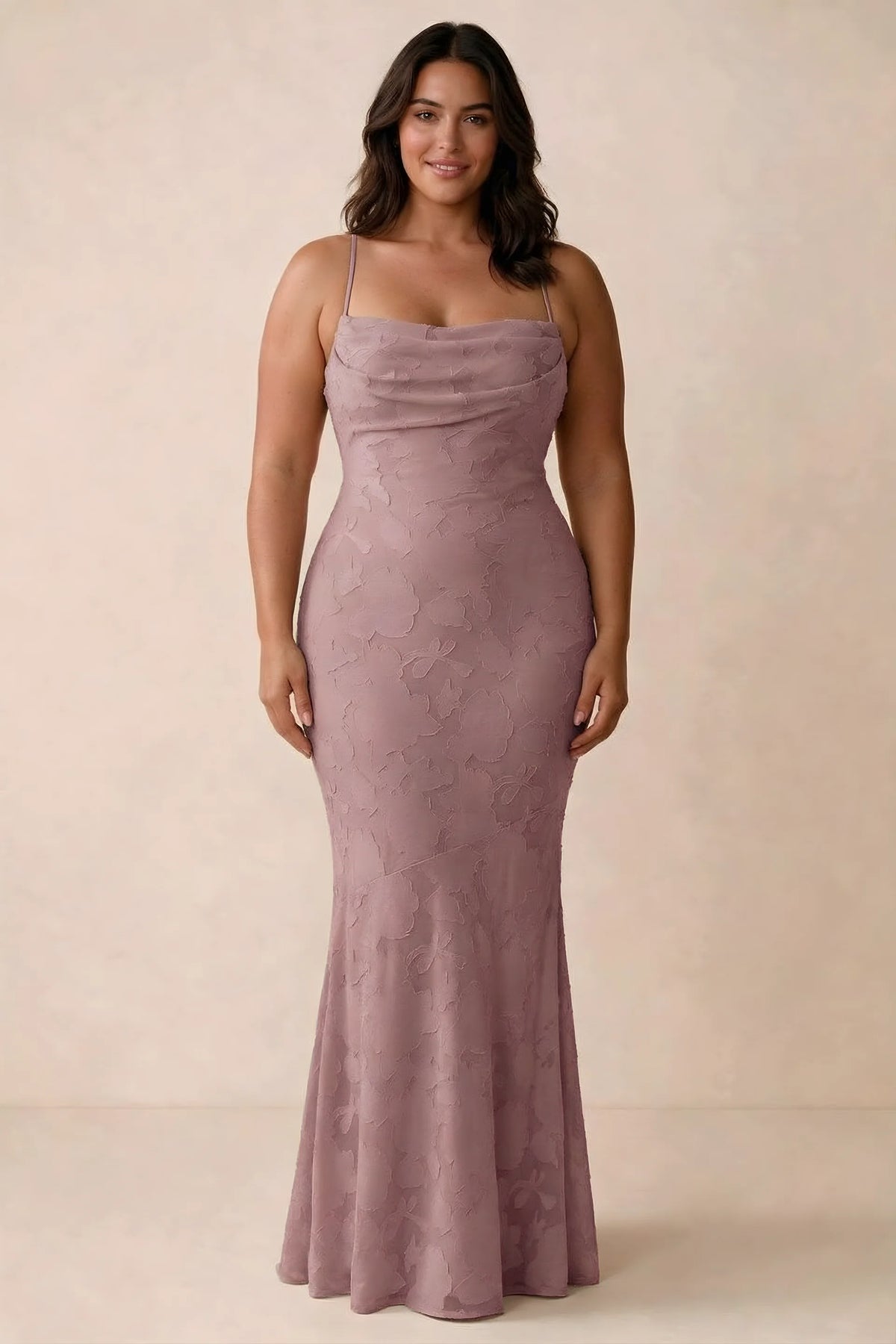 Front studio view of Bess dusty pink maxi dress showing tonal floral texture and a long skirt