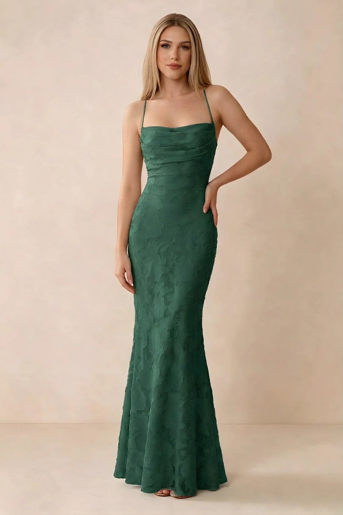 Front studio view of Bess emerald green floral burnout maxi dress with a draped cowl neckline and thin straps