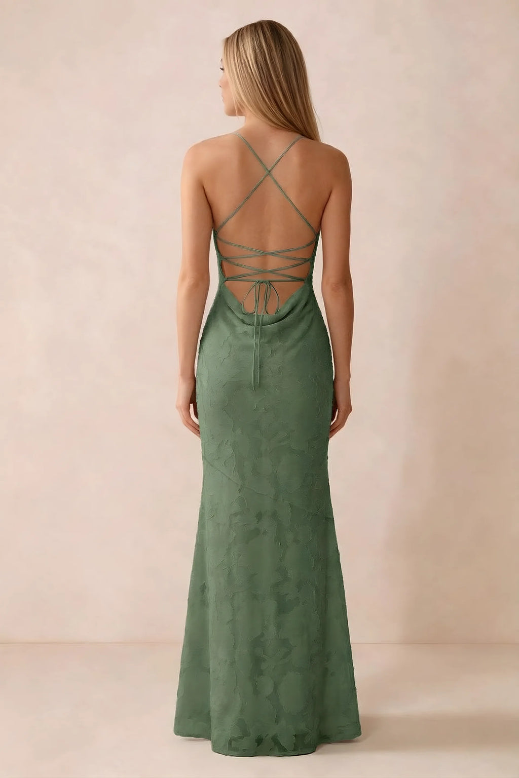 Rear studio view of Bess eucalyptus dress showing cross-back lacing above a low cowl drape