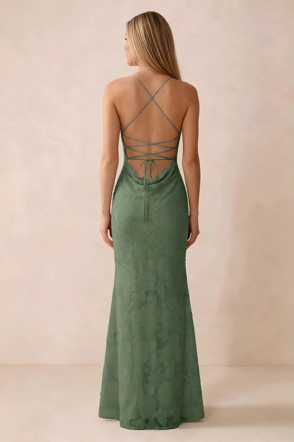 Rear studio view of Bess eucalyptus dress showing cross-back lacing above a low cowl drape