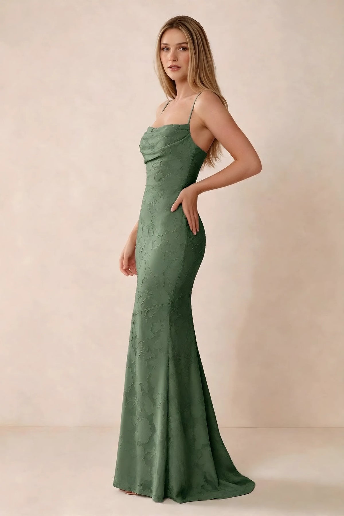 Three-quarter studio view of Bess eucalyptus dress showing the close-fitting waist and gently flared hem