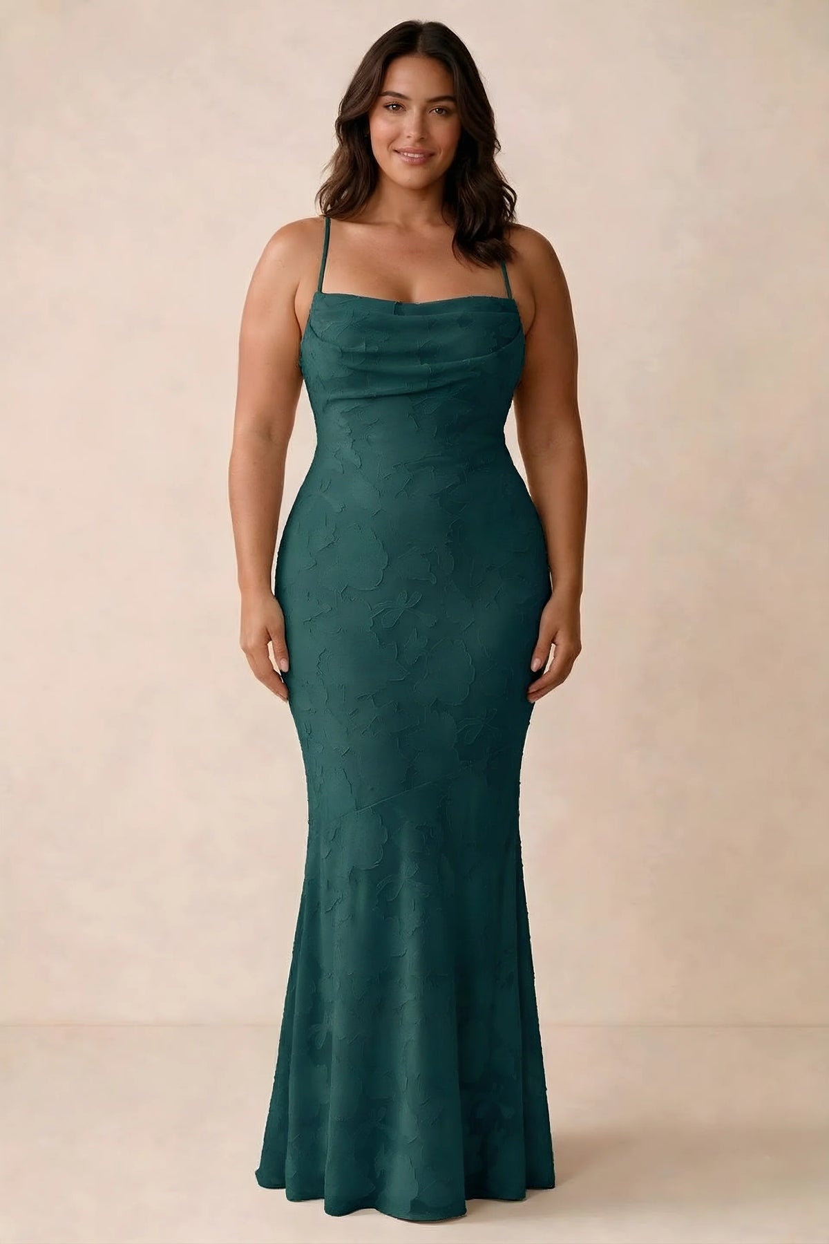 Front studio view of Bess forest green maxi dress showing tonal floral texture and a long skirt
