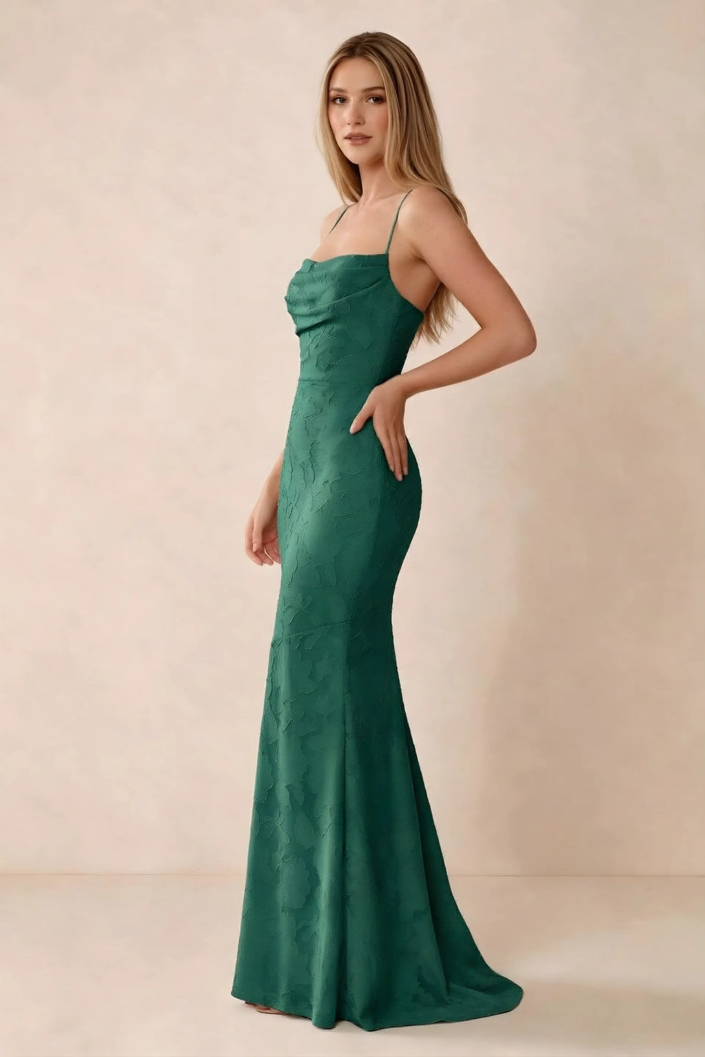 Three-quarter studio view of Bess hunter green dress showing the close-fitting waist and gently flared hem