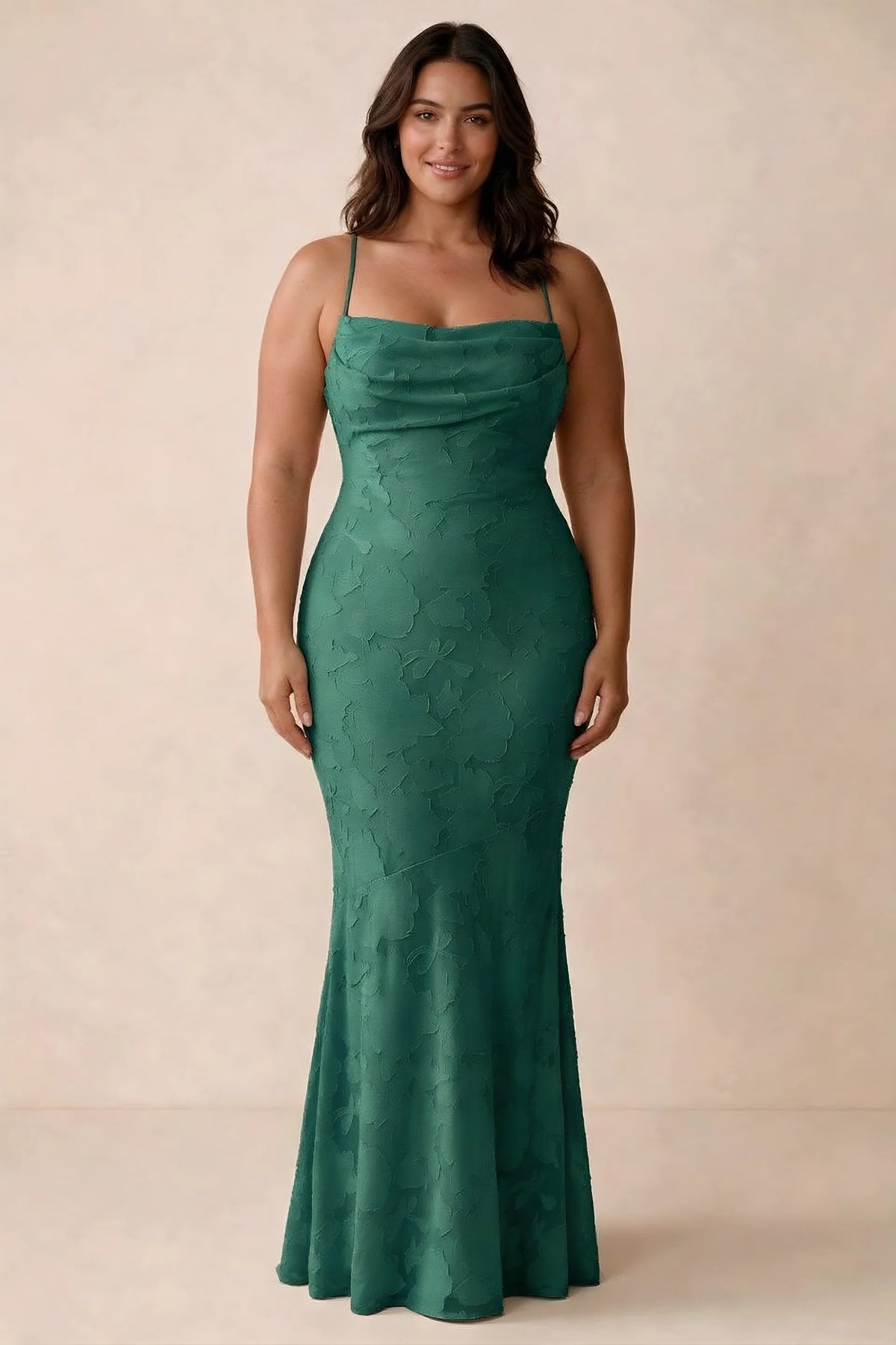 Front studio view of Bess hunter green maxi dress showing tonal floral texture and a long skirt