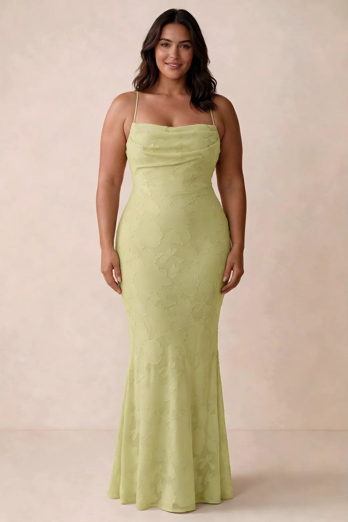 Front studio view of Bess lemon maxi dress showing tonal floral texture and a long skirt