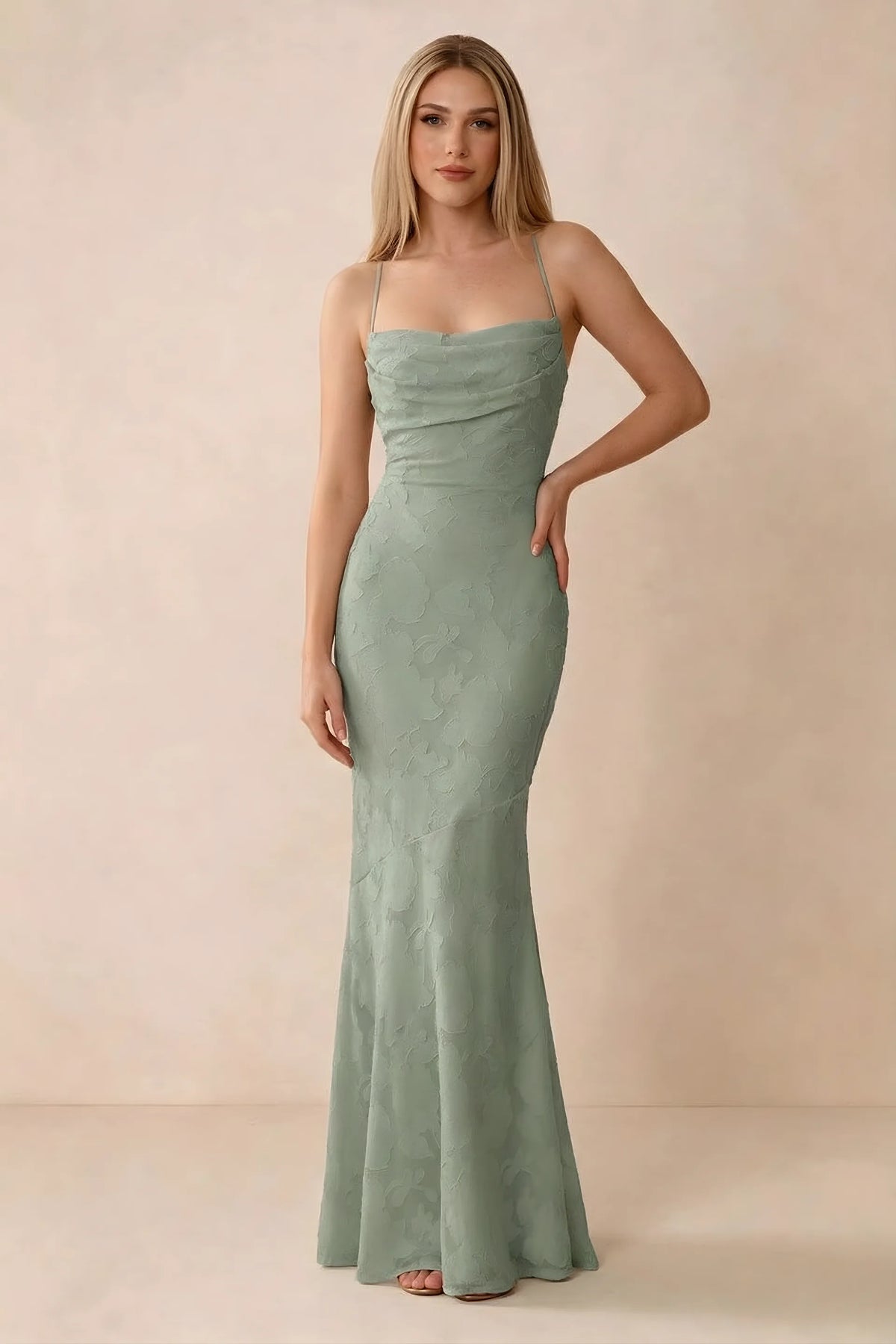 Front studio view of Bess light green floral burnout maxi dress with a draped cowl neckline and thin straps