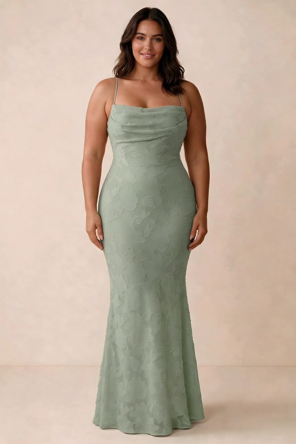 Front studio view of Bess light green maxi dress showing tonal floral texture and a long skirt