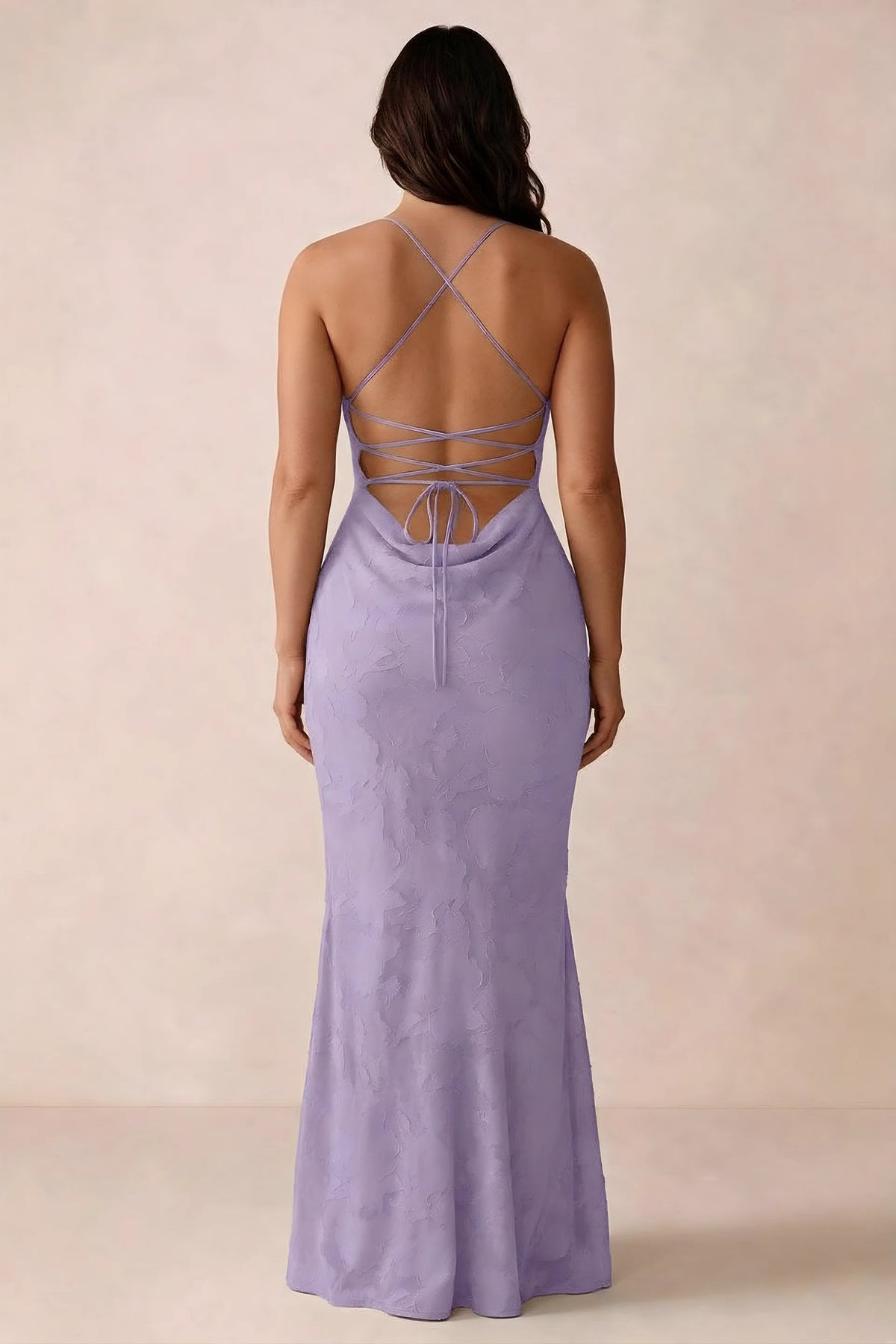 Back studio view of Bess lilac dress showing the crossed straps and full-length silhouette
