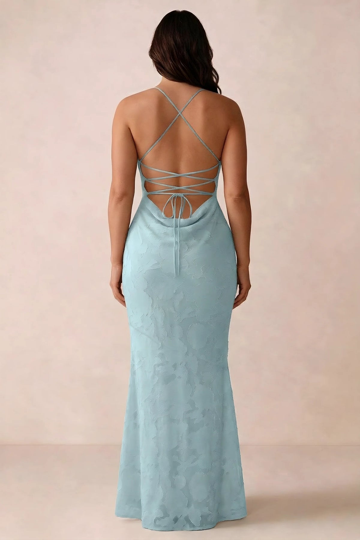 Back studio view of Bess mist dress showing the crossed straps and full-length silhouette