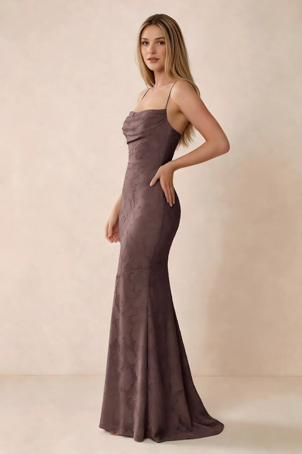 Three-quarter studio view of Bess mocha dress showing the close-fitting waist and gently flared hem