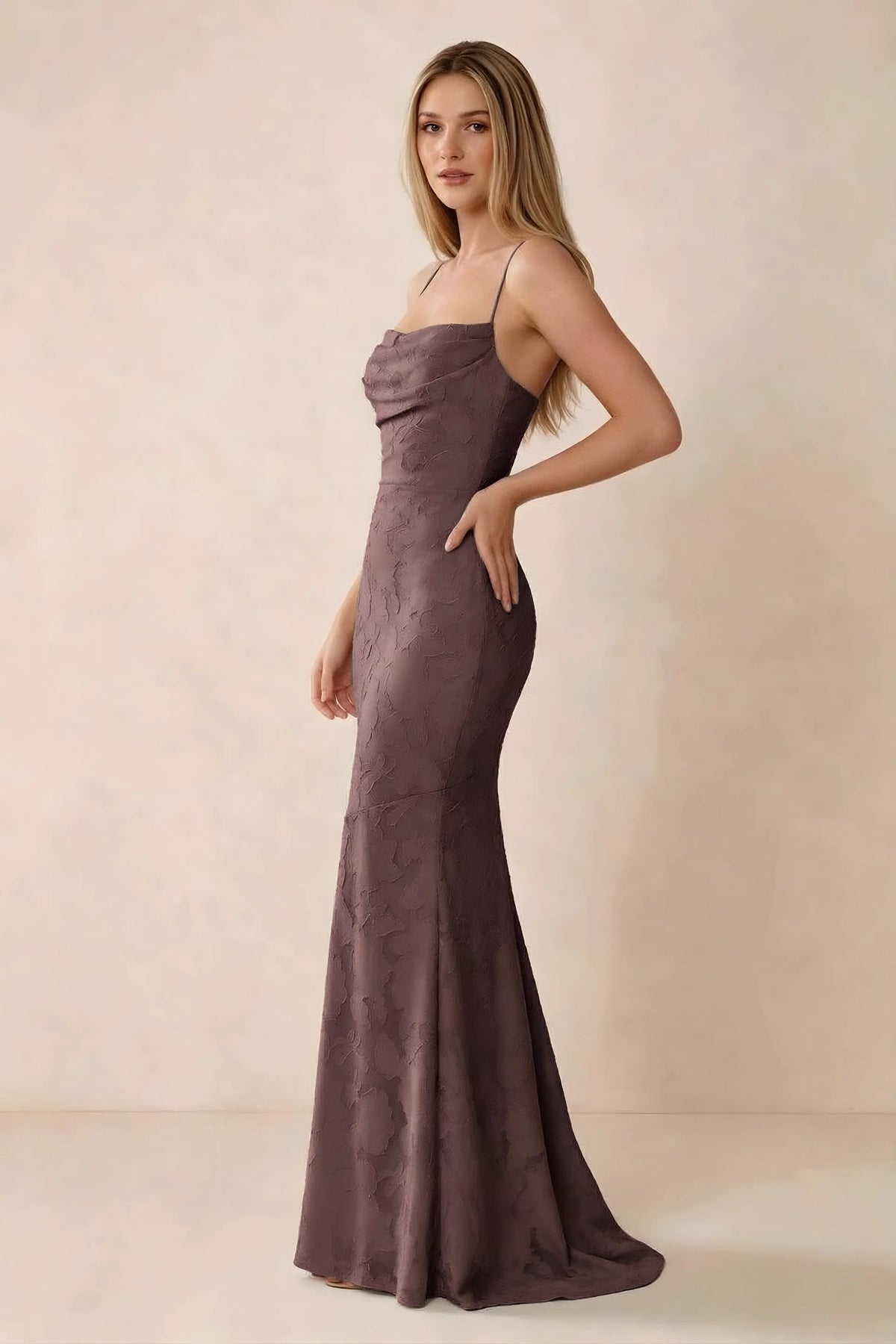 Three-quarter studio view of Bess mocha dress showing the close-fitting waist and gently flared hem
