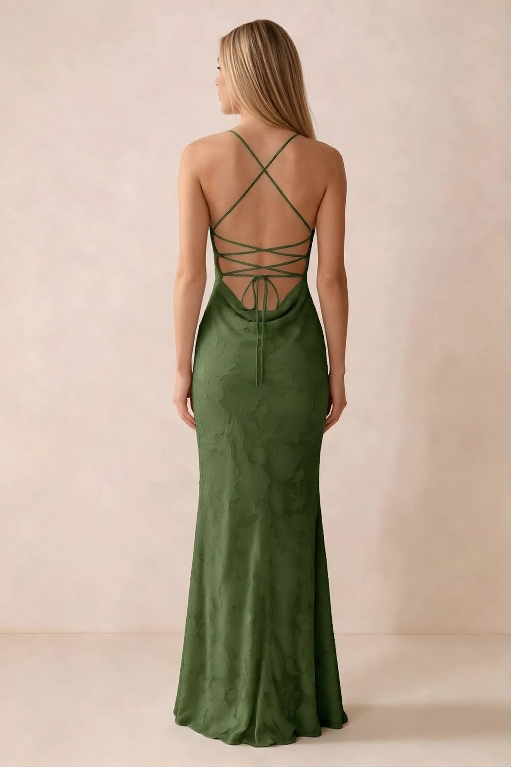 Rear studio view of Bess olive dress showing cross-back lacing above a low cowl drape