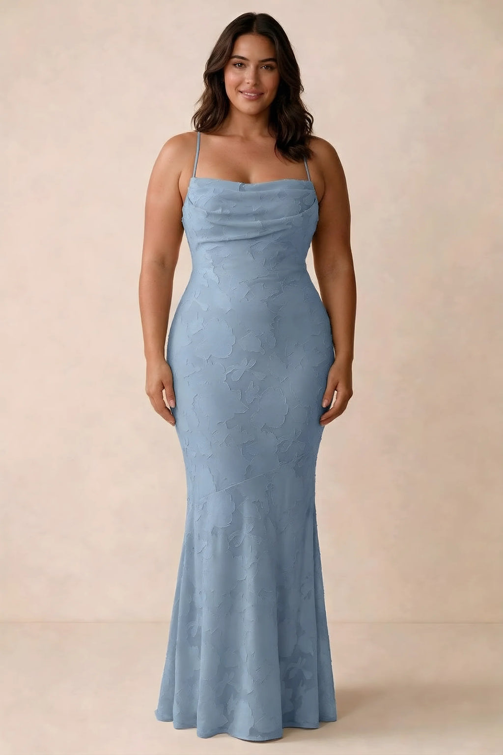 Front studio view of Bess powder blue maxi dress showing tonal floral texture and a long skirt