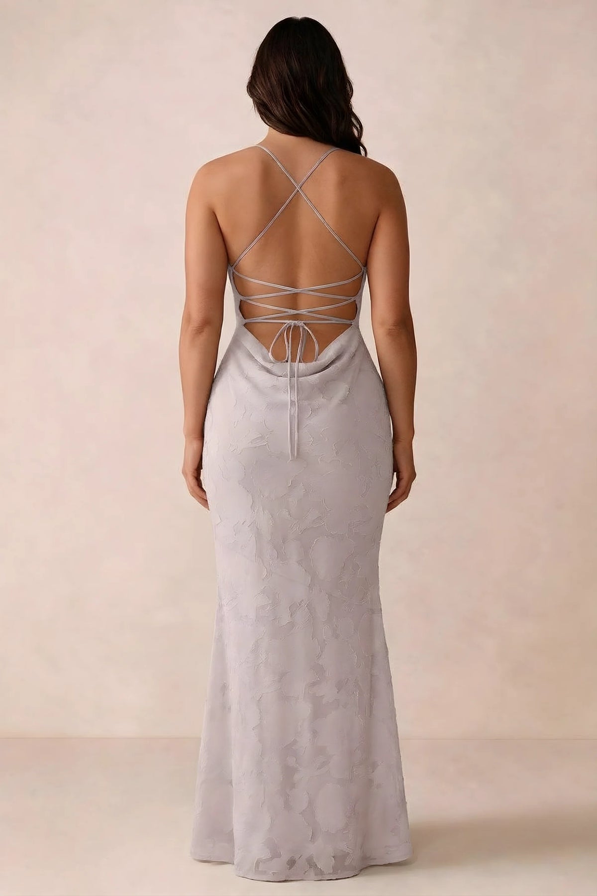 Back studio view of Bess powder pink dress showing the crossed straps and full-length silhouette
