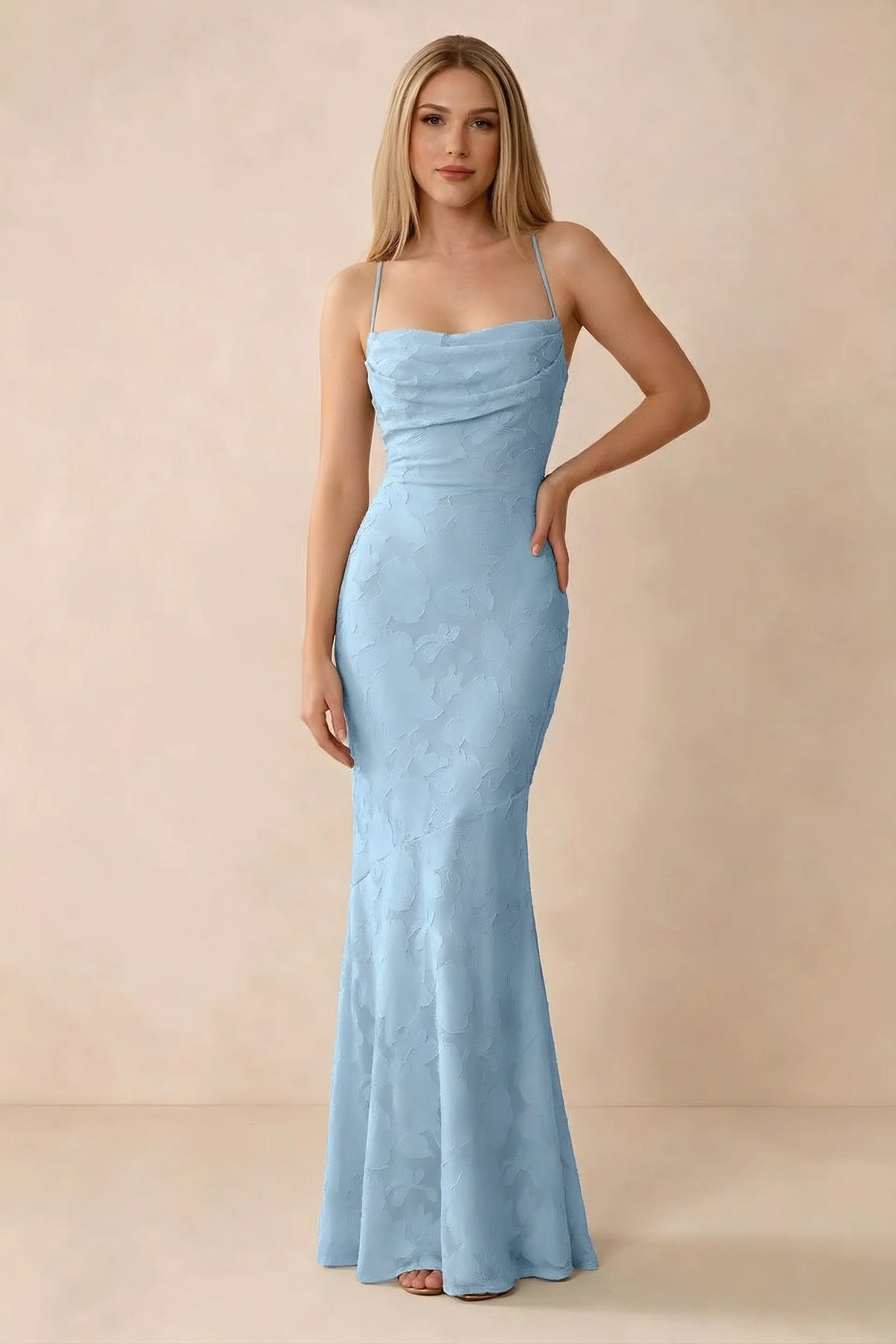 Front studio view of Bess sky blue floral burnout maxi dress with a draped cowl neckline and thin straps