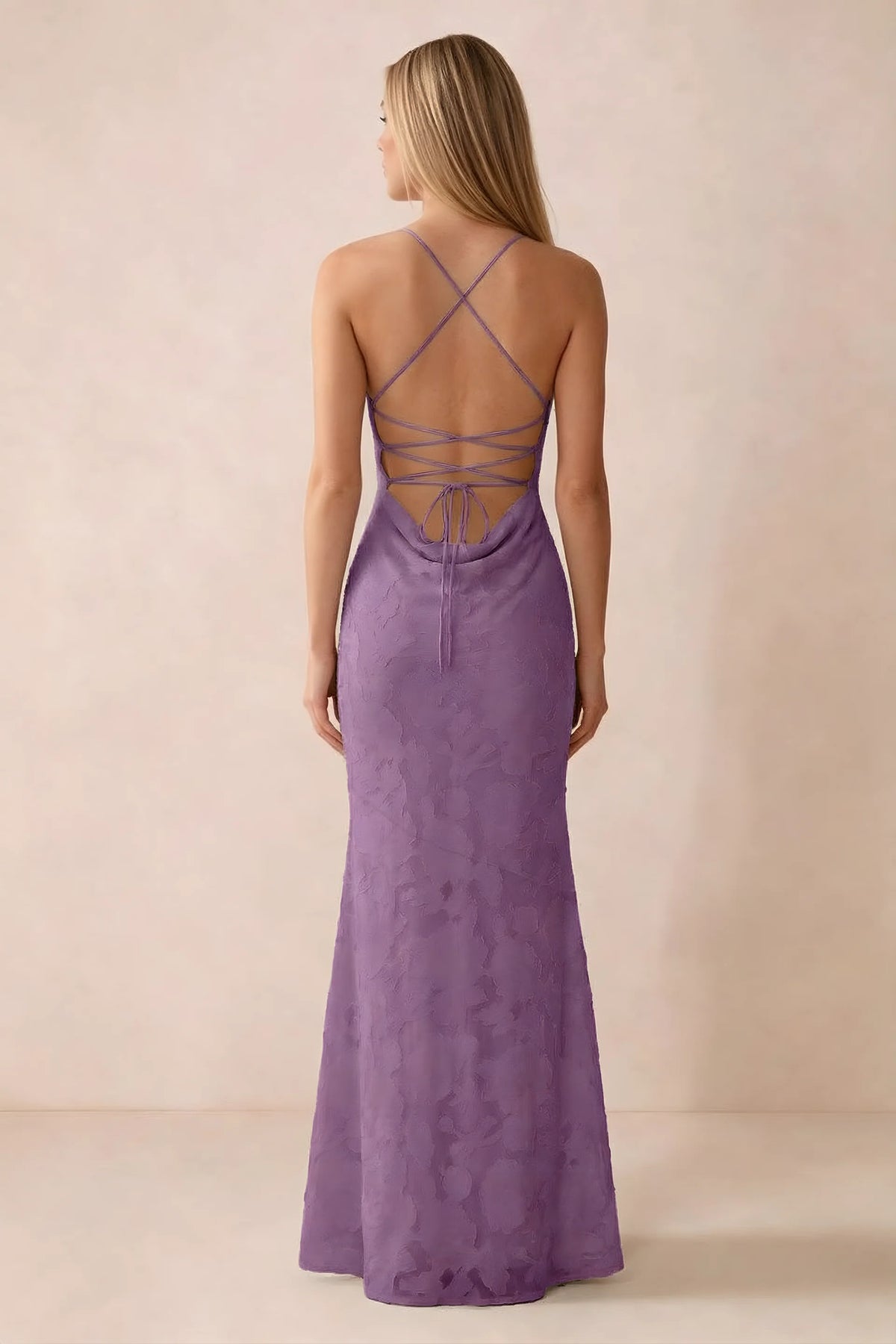 Rear studio view of Bess wisteria dress showing cross-back lacing above a low cowl drape