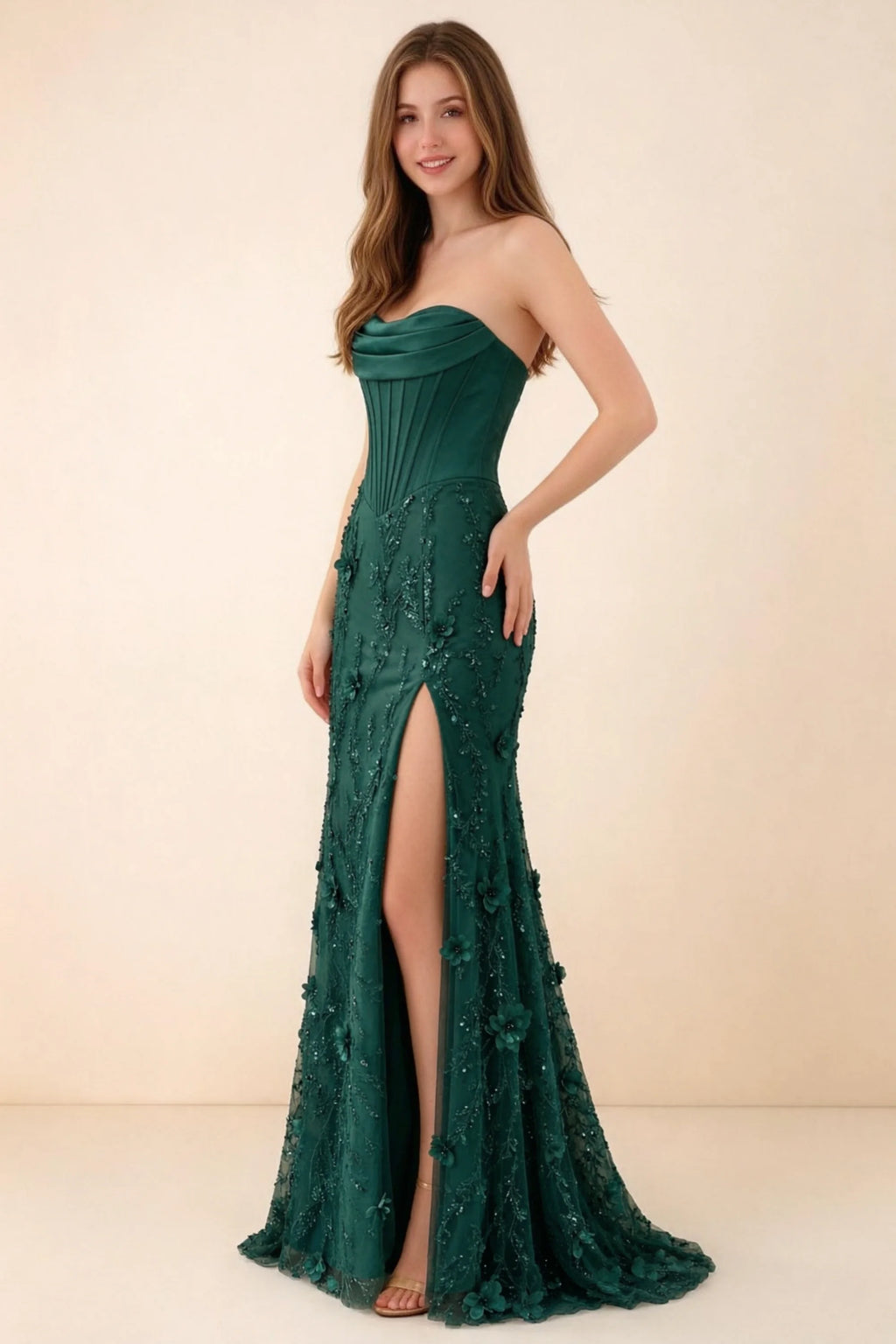 Three-quarter studio view of Beth dark green dress showing the pointed corset waist and side slit