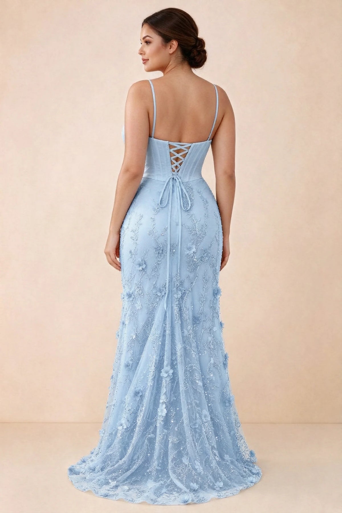 Rear studio view of Beth sky blue corset dress with fine straps, back ties and a trailing hem