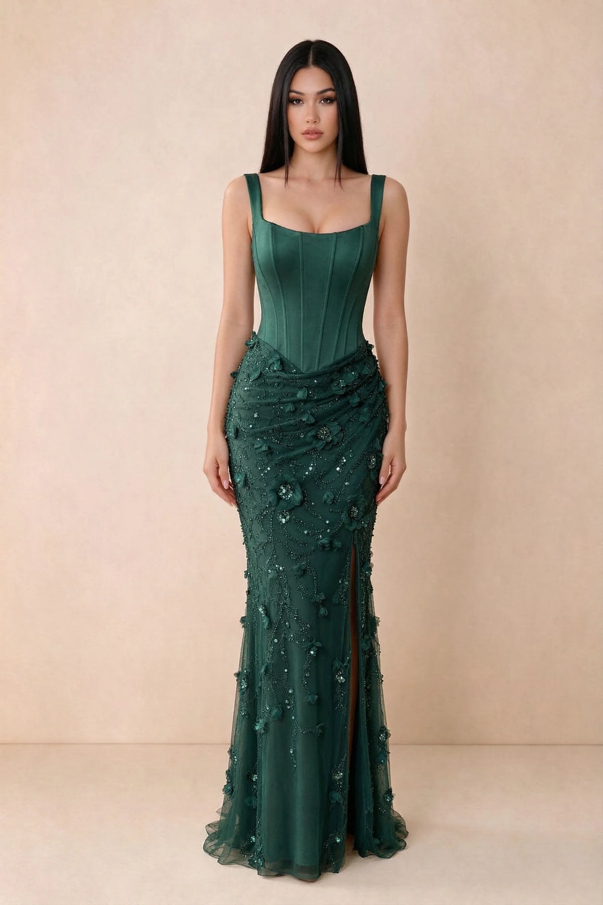 Front studio view of Betsy emerald green square-neck corset maxi dress with a floral skirt and high slit