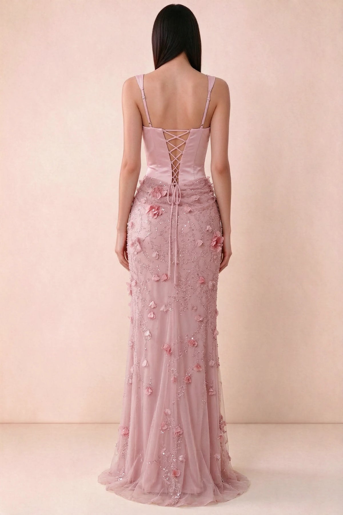 Rear studio view of Betsy pink dress showing adjustable shoulder straps and corset back lacing