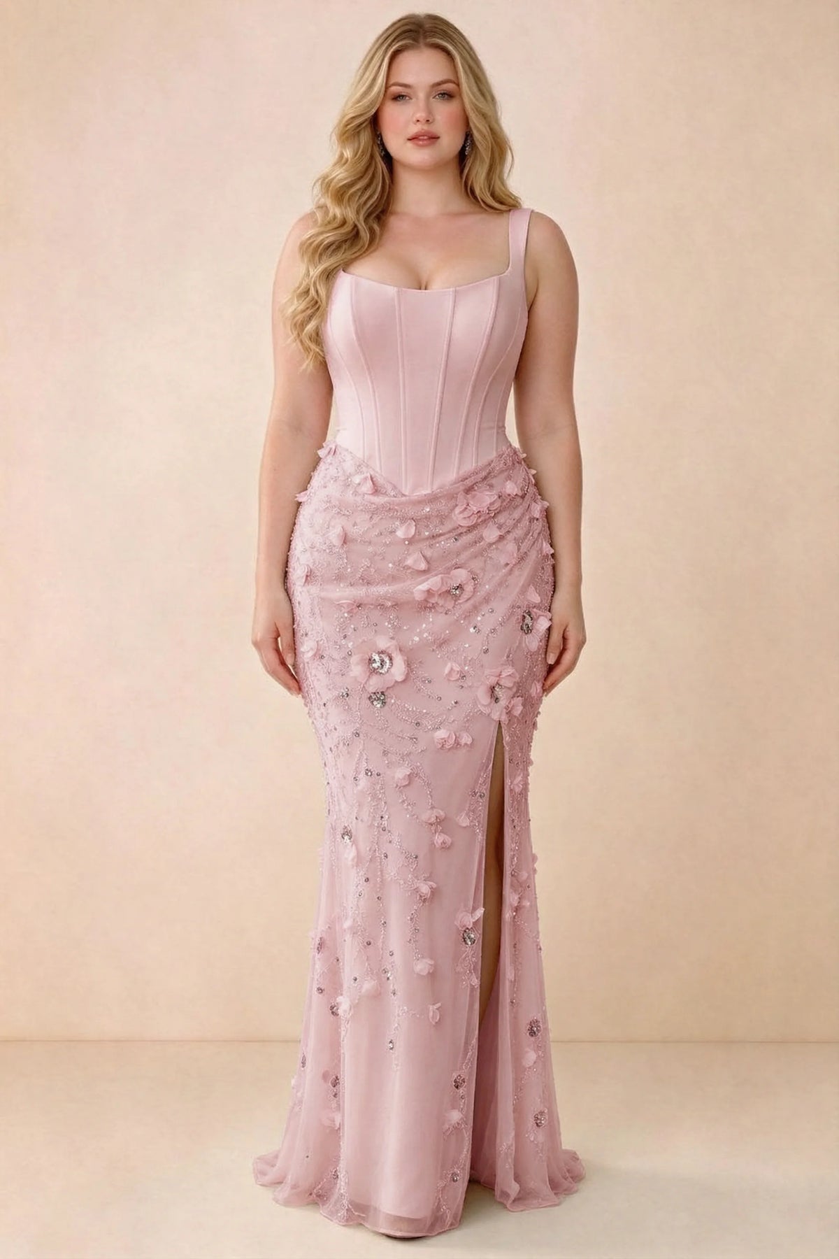 Front studio view of Betsy pink maxi dress with a pointed corset waist and embellished skirt