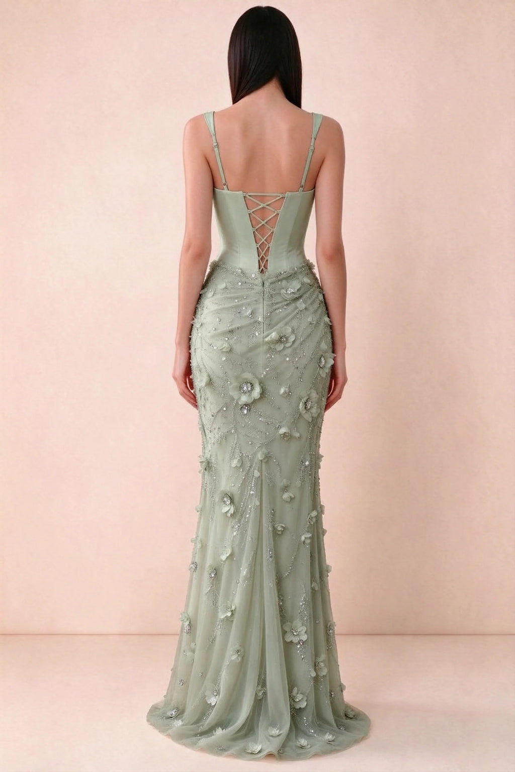 Rear studio view of Betsy sage green dress showing adjustable shoulder straps and corset back lacing