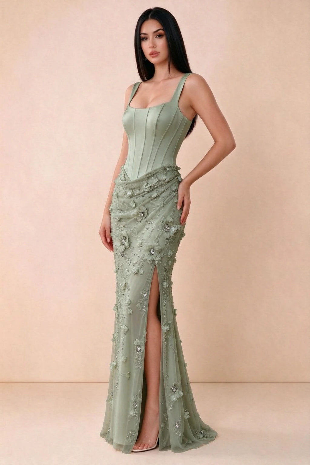 Three-quarter studio view of Betsy sage green dress showing the gathered hip detail and side slit
