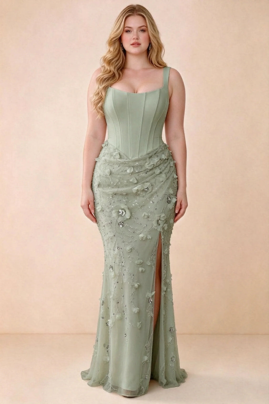 Front studio view of Betsy sage green maxi dress with a pointed corset waist and embellished skirt