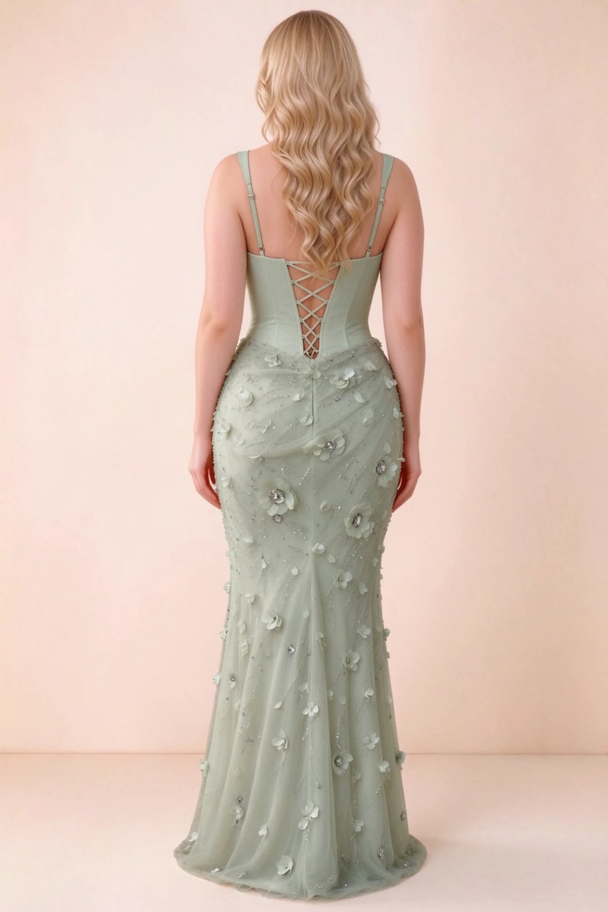 Rear studio view of Betsy sage green dress showing the broad straps and fitted floral skirt