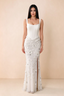 Front studio view of Betsy white square-neck corset maxi dress with a floral skirt and high slit