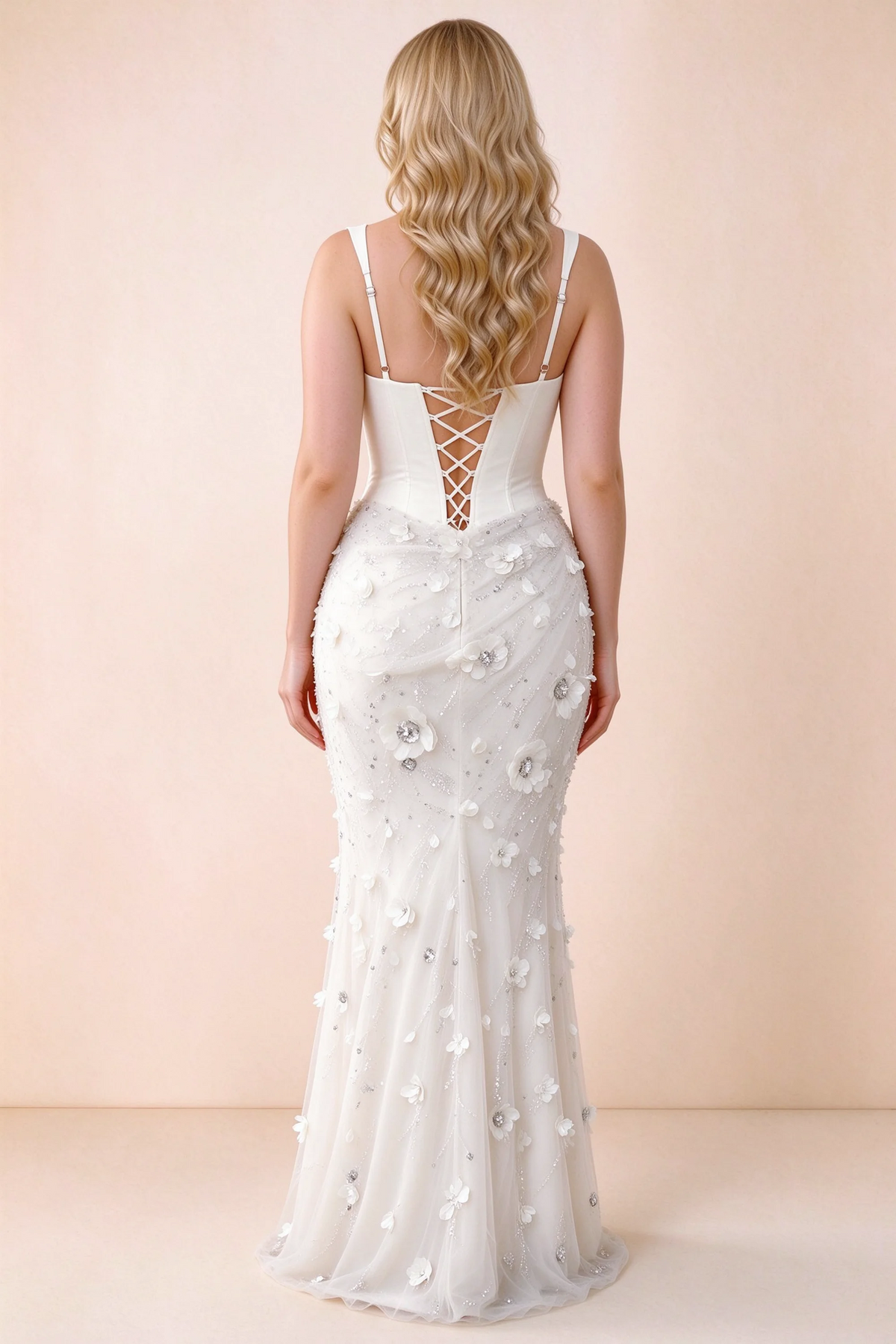 Rear studio view of Betsy white dress showing the broad straps and fitted floral skirt