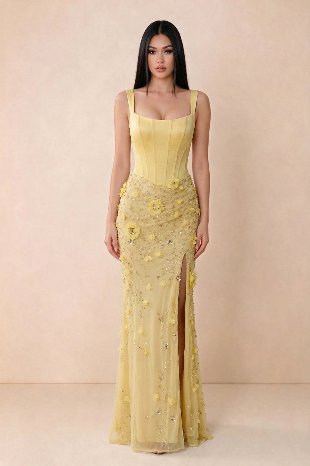 Front studio view of Betsy yellow square-neck corset maxi dress with a floral skirt and high slit