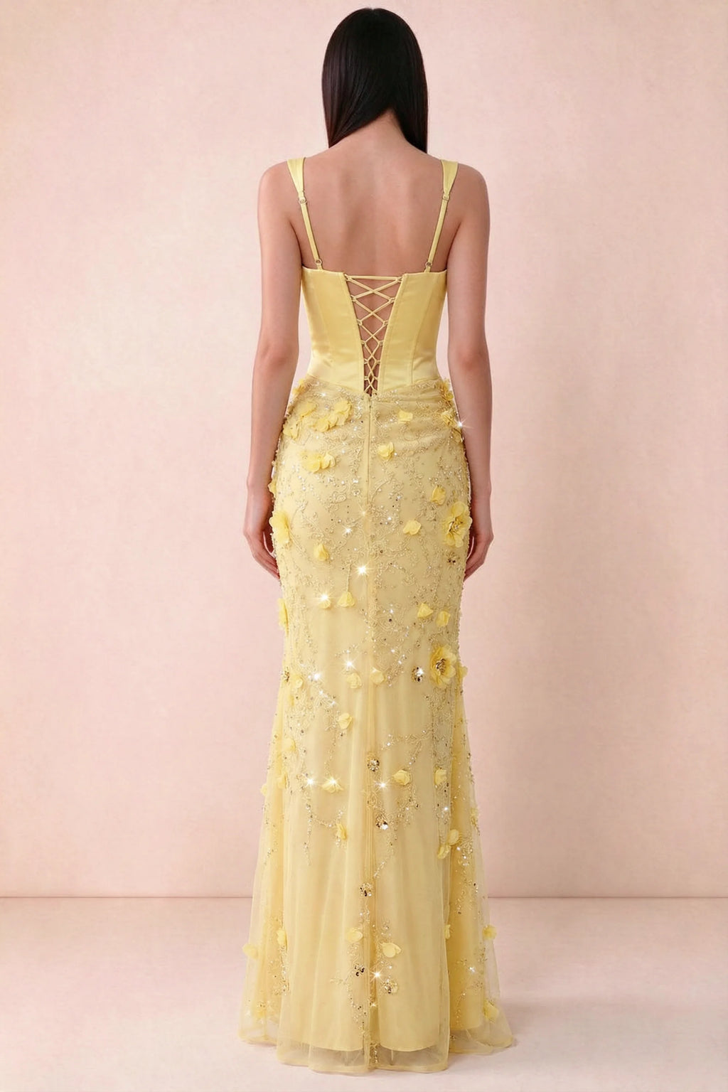 Rear studio view of Betsy yellow dress showing adjustable shoulder straps and corset back lacing