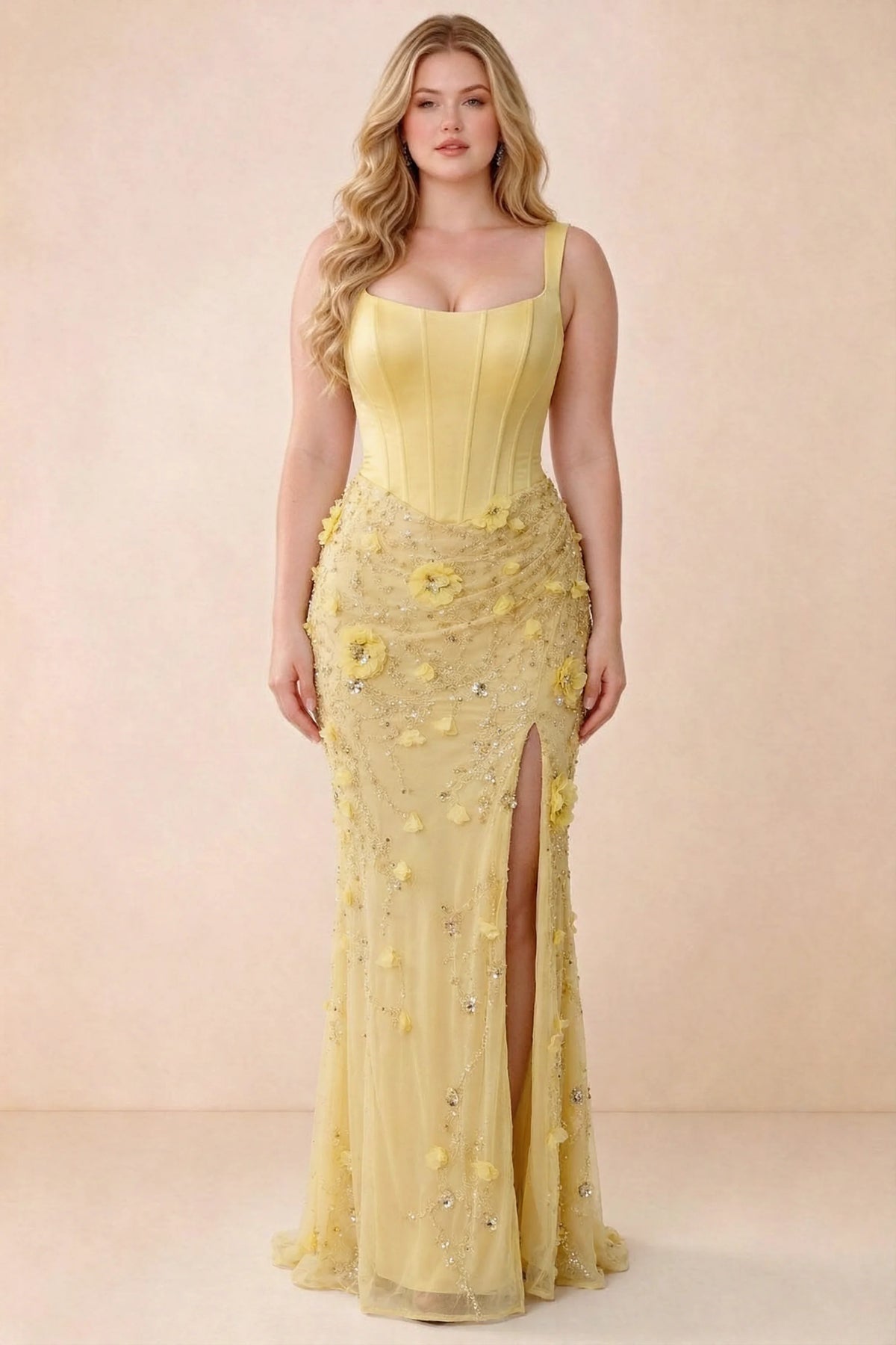 Front studio view of Betsy yellow maxi dress with a pointed corset waist and embellished skirt