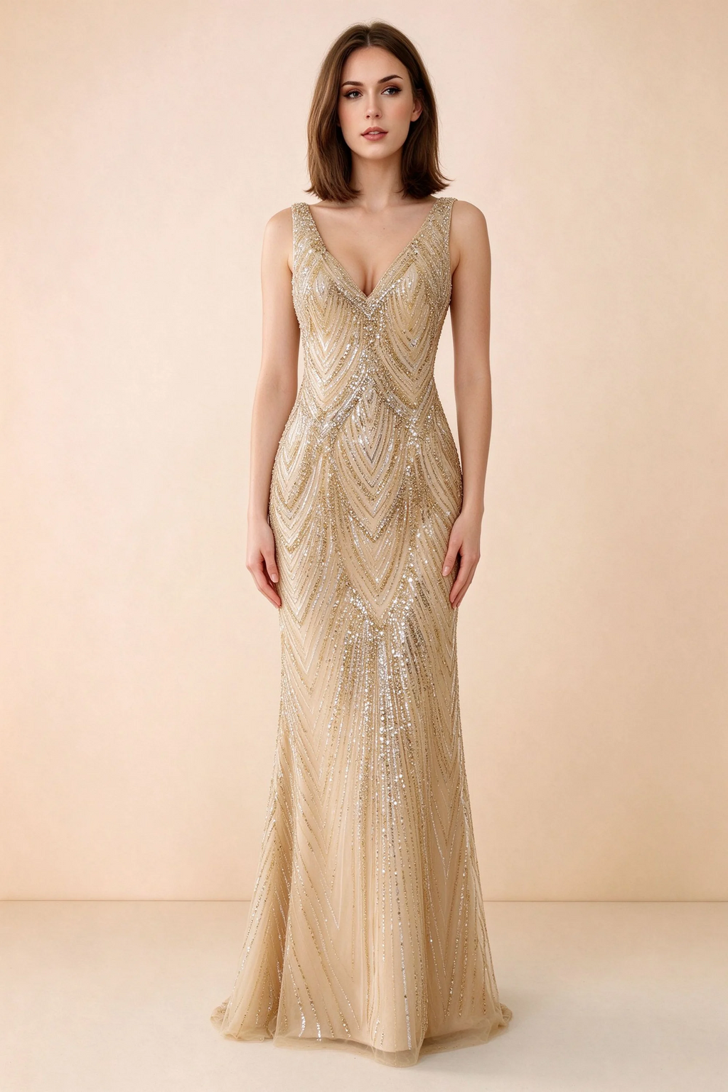 Front studio view of Betty champagne sequin maxi dress showing the V-neck and geometric pattern