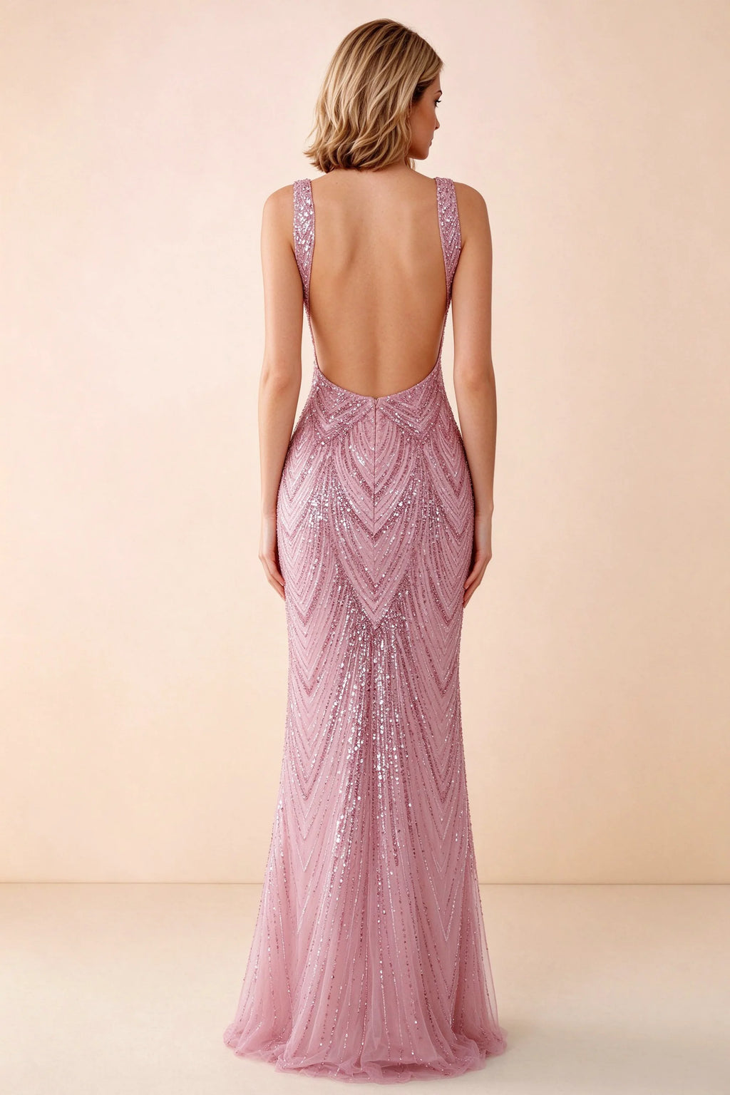 Rear studio view of Betty pink dress showing wide shoulder straps and a low scooped open back